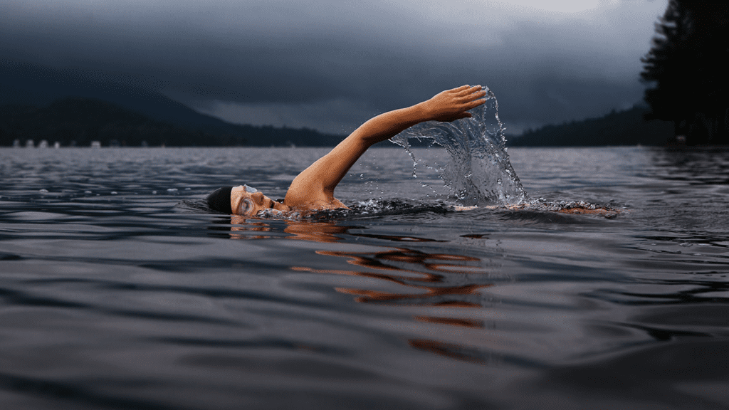 Person in lake swimming